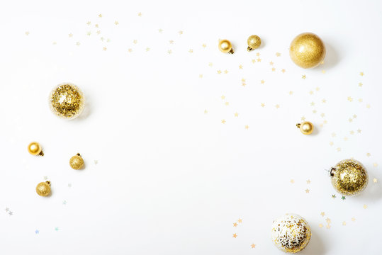 Gold Christmas balls on white background