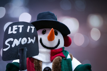 snowman standing in winter christmas, Merry Christmas and happy New Year greeting winter bokeh...
