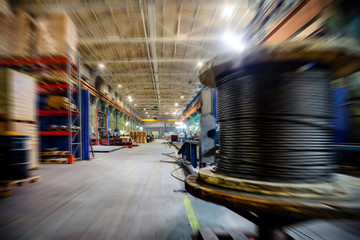 Large industrial shop, motion blur effect.