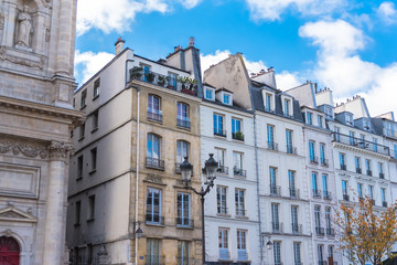 Fototapeta na wymiar Paris, typical facades in the Marais, beautiful buildings 