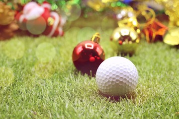 Golf ball with Christmas ornament for golfer holiday