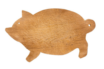 Altes Vesperbrett, Schinkenbrett in der Form eines Schweines isoliert auf weißem Hintergrund
