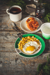 fried eggs for breakfast and a mug of tea