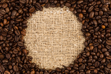 Round copy space in the middle of coffee beans
