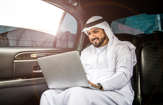 Arabian businessman portrait while using laptop