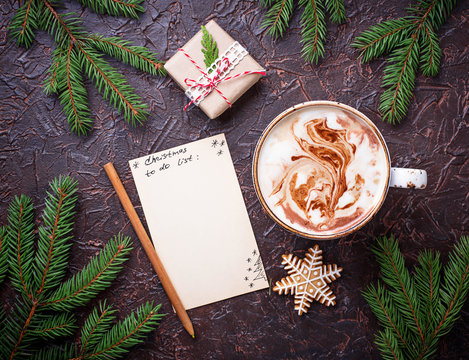Christmas to do list and cup of latte