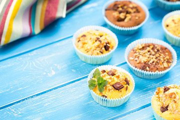 Fresh muffins with nuts and chocolate