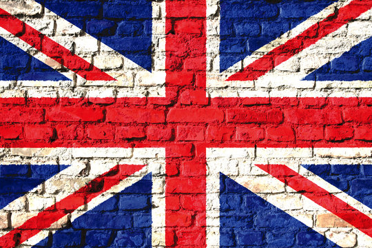 United Kingdom (UK) flag painted on a brick wall. Concept image for Great Britain, British, England, English language and culture.