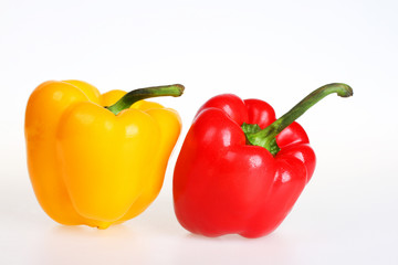 Yellow and red bell pepper isolated on white