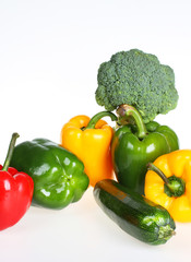 Green,red and yellow bell pepper with broccoli and zucchini