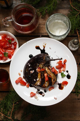 fried eggplants with tomato salsa and balsamic - serving