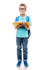 schoolboy with glasses with a book on a white background