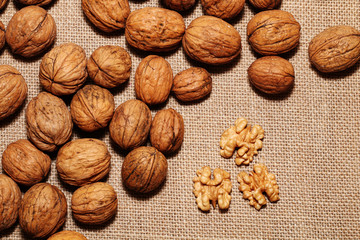 Walnuts against the background of cloth burlap
