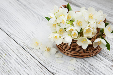 Fototapeta na wymiar Basket with jasmine flowers