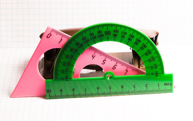 school supplies on the open notebook, photos in high key