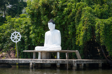 buddha statue on river bank