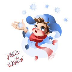 Adorable boy catches the first snowflake