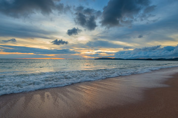 view of the sunset by the Andaman Sea from Ao Nang Beach, Krabi, Thailand