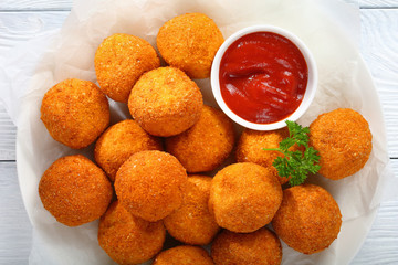 deep fried potato croquettes on plate