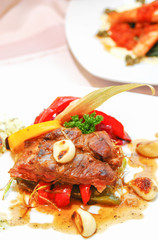 steak cooked on a grill with garlic