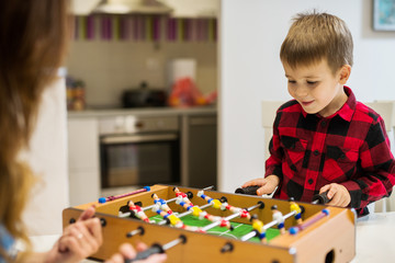 Mom and son are playing