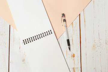 Notepad on the wooden desk table