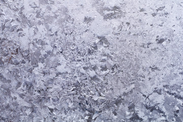 Winter texture. Ice pattern on the frozen winter window
