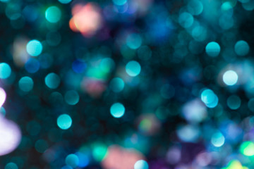 Fototapeta na wymiar Colorful glitter abstract background with bokeh