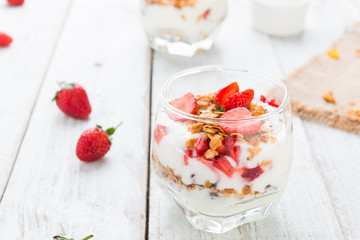 Strawberry , granola and yogurt healthy breakfast parfait