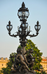 Fototapeta na wymiar Luxurious street lamp in Paris, France
