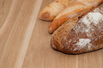 Bread on a wooden background with space for text