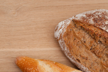 Bread on a wooden background with space for text