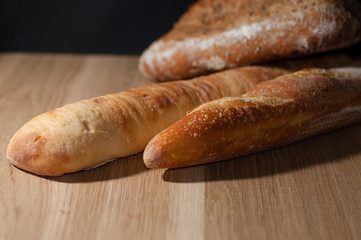French bread on a black background