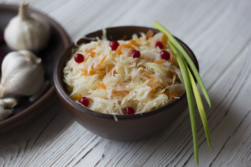 sauerkraut, onion, garlic on the table