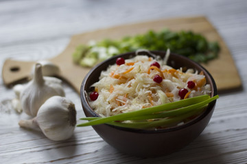 sauerkraut, onion, garlic on the table