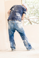 Construction worker with jeans and street shoes