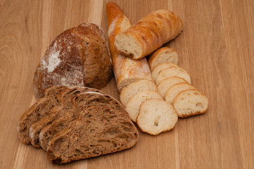Bread chopped on wooden board with space for text