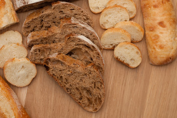 Bread chopped on wooden board with space for text