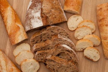 Bread chopped on wooden board with space for text