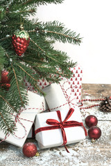 Fototapeta na wymiar Christmas holiday background. Gifts under christmas tree.
