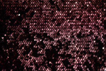 Background texture, pattern. Black and red Cloth paillettes. Look at these Neon black and red Paillette Sequins. Ideal for events, celebrations and christmas