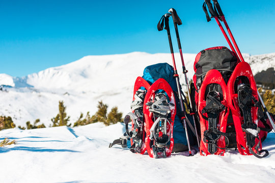 Backpack, snowshoes and trekking poles.