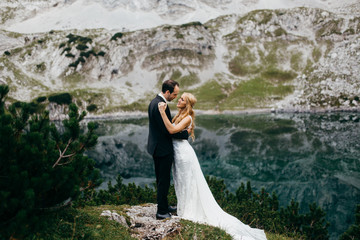 Wedding couple near the dragon lake 