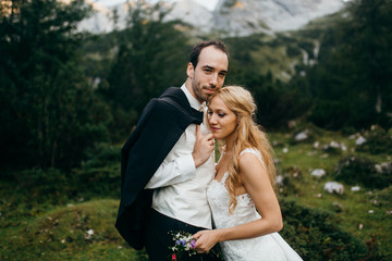 Wonderful wedding couple at the summer 