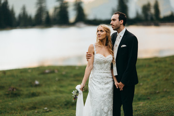 Wonderful wedding couple at the summer 
