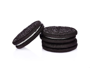 sandwich cookies with cream on white background