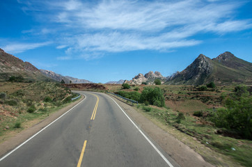 Fototapeta na wymiar Open Road Leading into Mountains, Bolivia