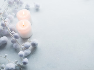 candles on white background. winter decor. coziness spa concept