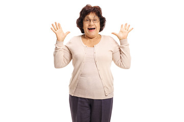 Surprised senior lady gesturing with her hands