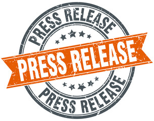 press release round grunge ribbon stamp